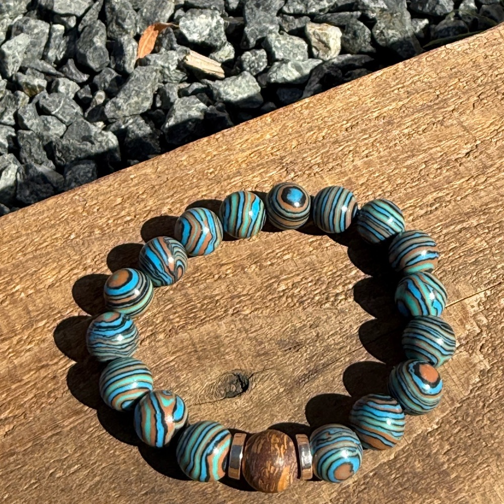 Rainbow Calsilica and focal bead of elephant skin Beaded Bracelet